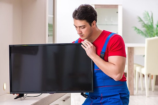 pngtree professional repair engineer repairing broken tv photo image 1834786